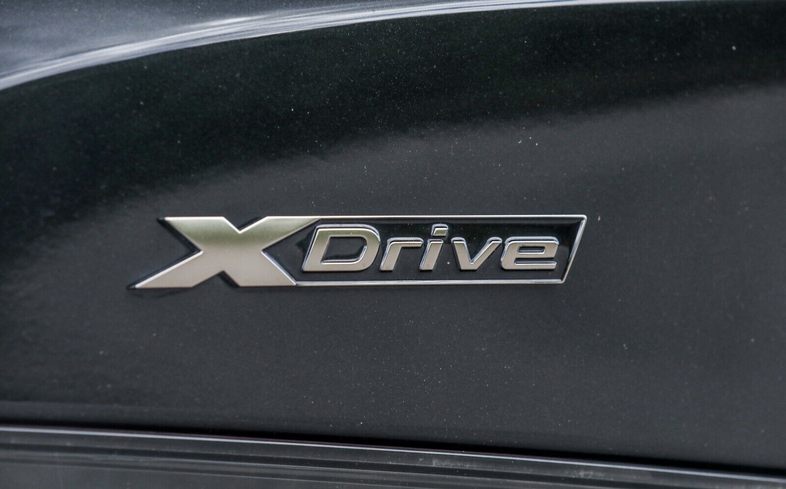 xDrive badge BMW on trunk